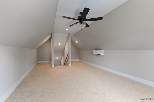 bonus room with light carpet, lofted ceiling, an AC wall unit, and ceiling fan