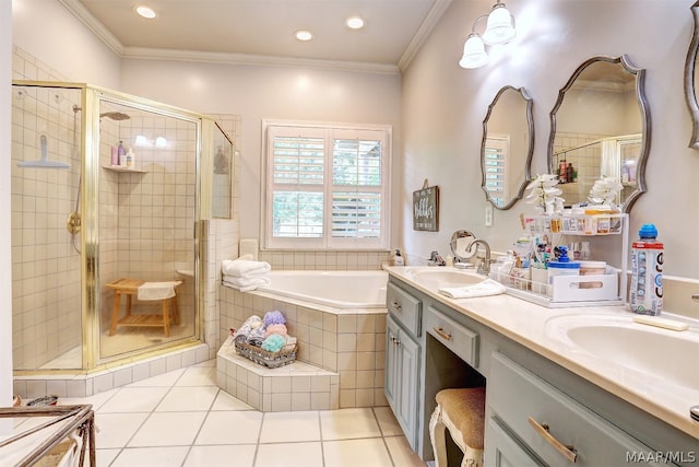 bathroom featuring tile patterned floors, crown molding, vanity, and shower with separate bathtub