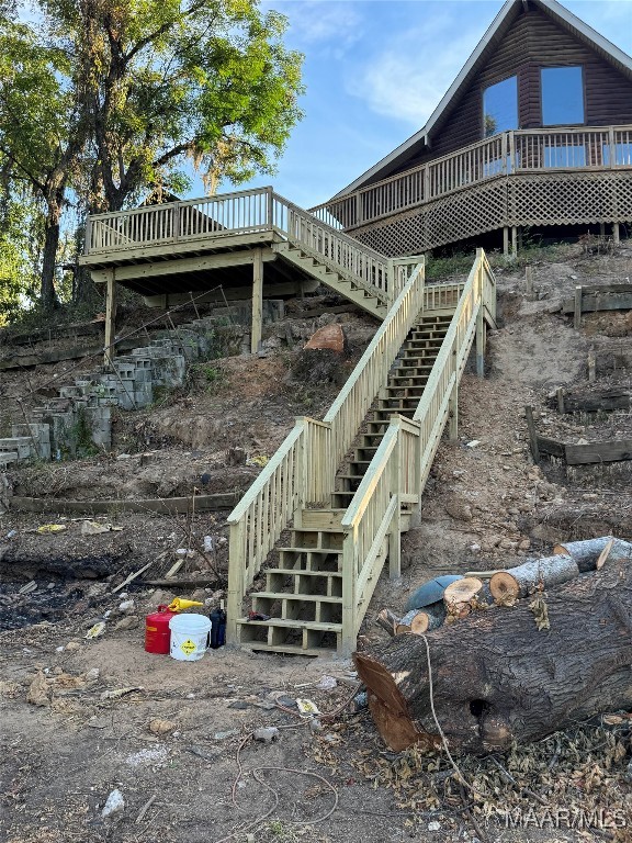 view of yard featuring a wooden deck