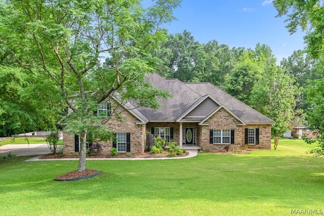 craftsman-style house with a front yard