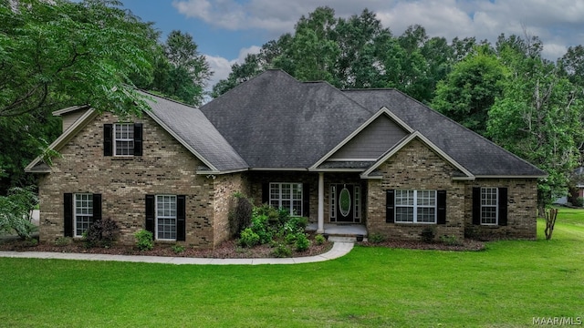 craftsman-style home with a front yard