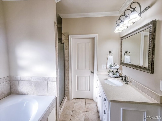 bathroom with tile patterned flooring, vanity, separate shower and tub, and ornamental molding