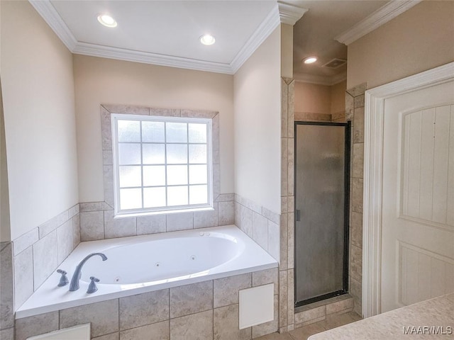 bathroom with ornamental molding and independent shower and bath