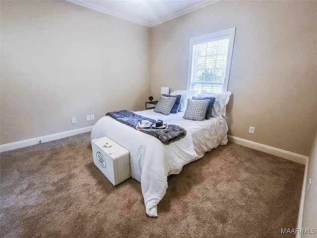 carpeted bedroom featuring ornamental molding