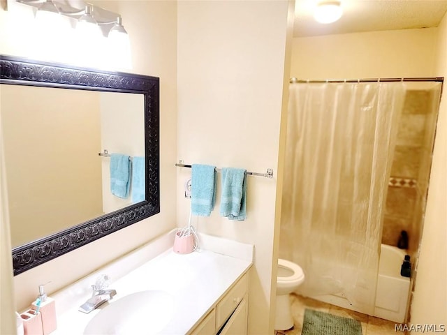 full bathroom with tile patterned floors, toilet, vanity, and shower / tub combo with curtain