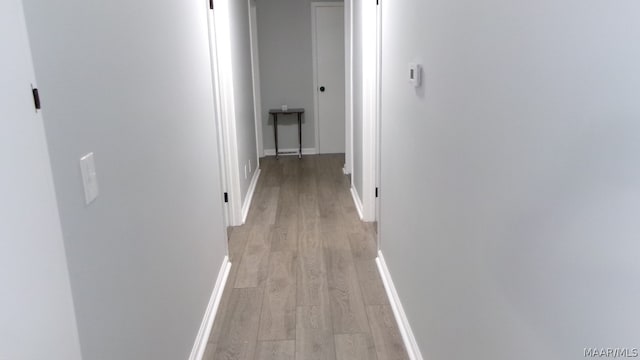 hall featuring light hardwood / wood-style flooring