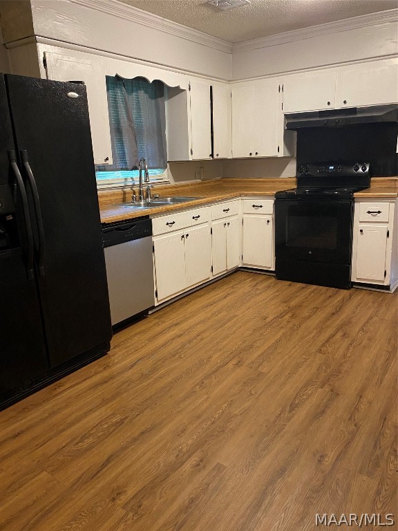 kitchen with white cabinetry, light wood-type flooring, a textured ceiling, black appliances, and sink