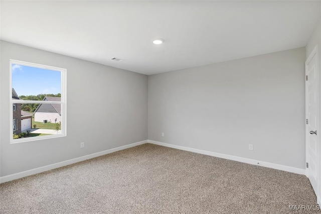 view of carpeted spare room