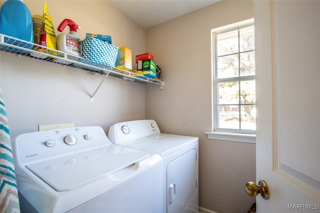 laundry area with washing machine and dryer