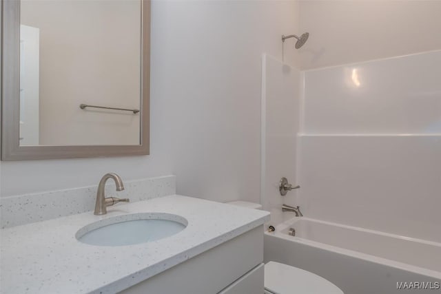 full bathroom with vanity, shower / bathtub combination, and toilet