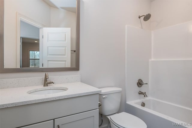 full bathroom with vanity, bathtub / shower combination, and toilet