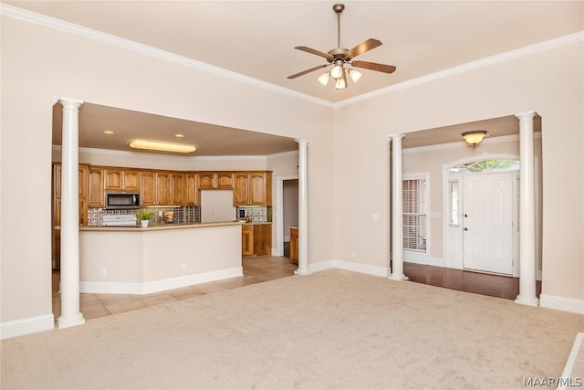 unfurnished living room with ceiling fan, light colored carpet, and ornamental molding