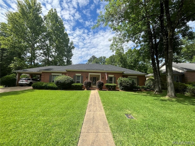 ranch-style house with a carport and a front lawn