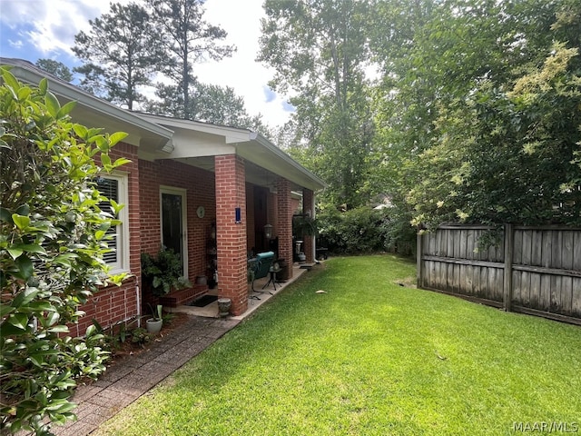 view of yard with fence