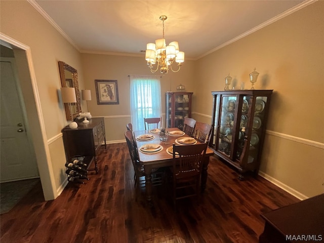 dining area featuring baseboards, ornamental molding, a chandelier, and dark wood-style flooring