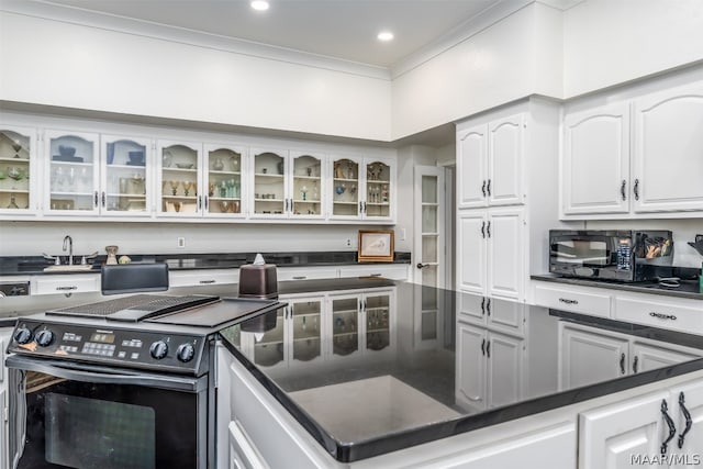 kitchen with white cabinetry, electric stove, and ornamental molding