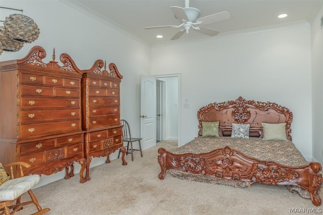 bedroom featuring ornamental molding, recessed lighting, light carpet, and a ceiling fan