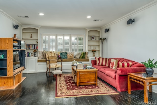 living room featuring built in features, dark hardwood / wood-style flooring, and ornamental molding