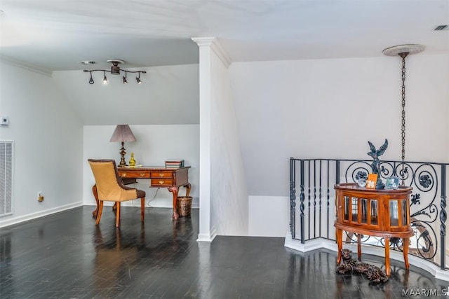 living area featuring ornate columns, baseboards, vaulted ceiling, and dark wood-type flooring