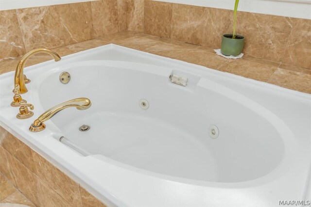 details featuring tiled bath