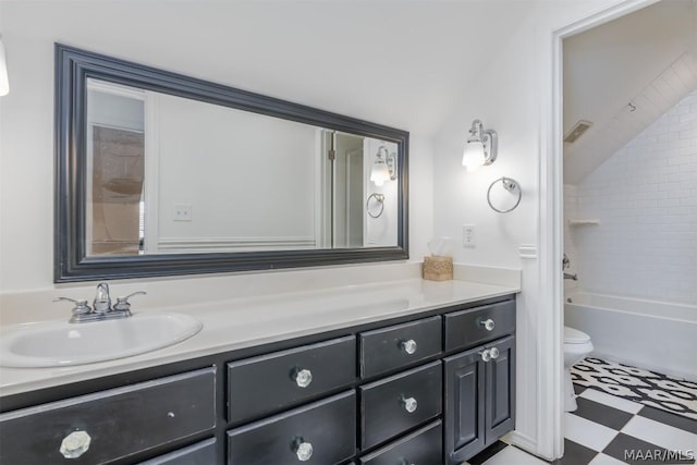 bathroom featuring visible vents, toilet, tile patterned floors, vanity, and washtub / shower combination