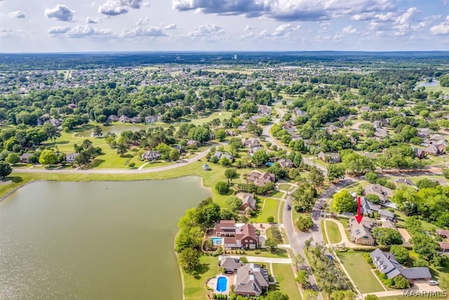 bird's eye view featuring a water view and a residential view