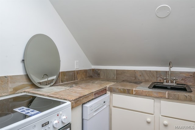 kitchen featuring white cabinetry, sink, stove, and dishwasher