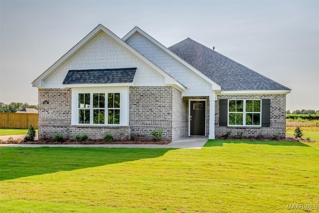 view of front facade with a front lawn