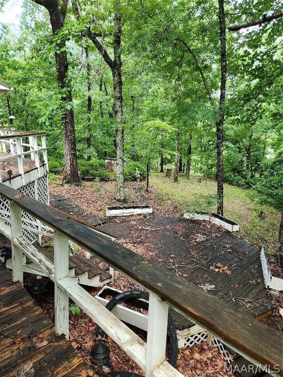 view of yard with a wooden deck