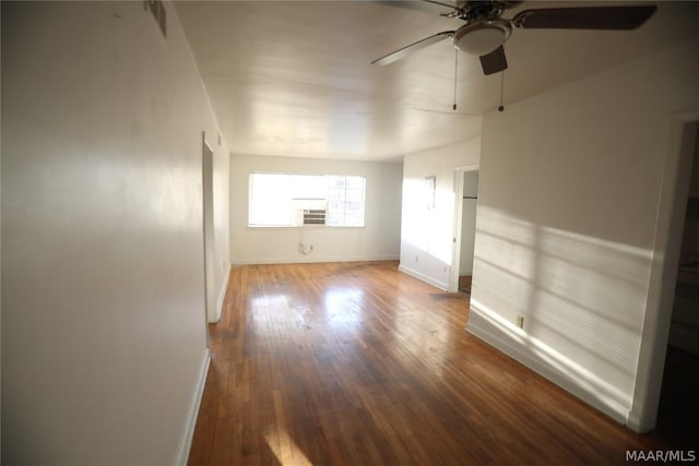 spare room featuring ceiling fan and wood-type flooring