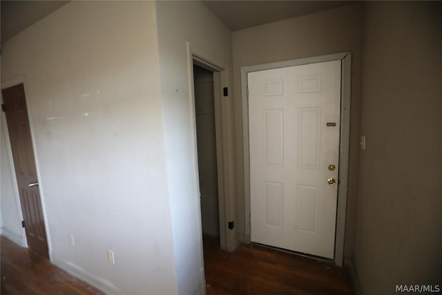 hallway featuring dark wood-type flooring