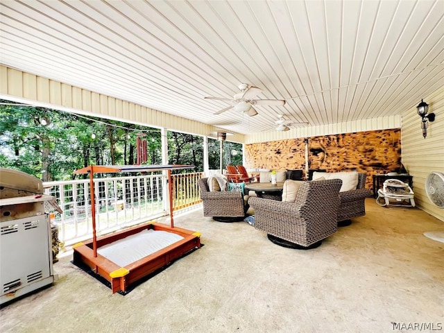 view of patio featuring outdoor lounge area and ceiling fan