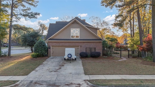 view of side of home featuring a yard and a garage