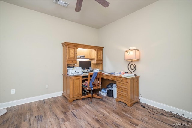 office space featuring light hardwood / wood-style flooring and ceiling fan