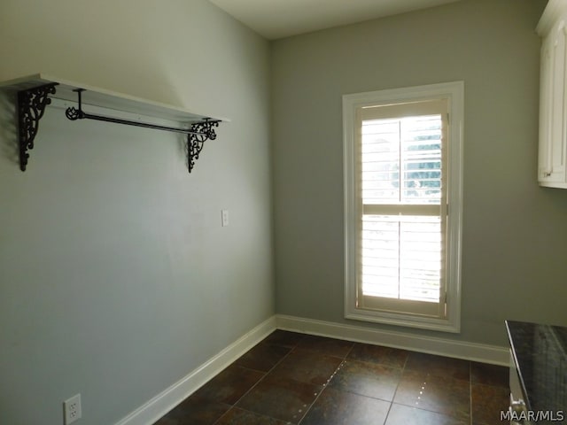 spare room featuring a wealth of natural light