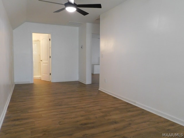 spare room with lofted ceiling, ceiling fan, and dark hardwood / wood-style floors