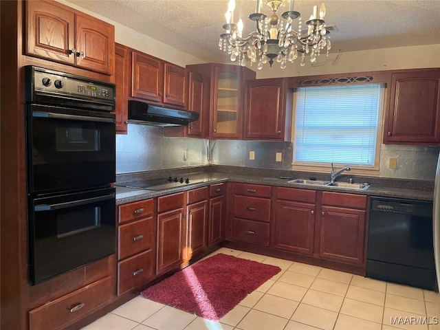 kitchen featuring decorative backsplash, a textured ceiling, sink, black appliances, and a chandelier