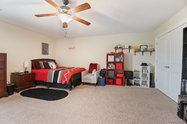 carpeted bedroom featuring ceiling fan