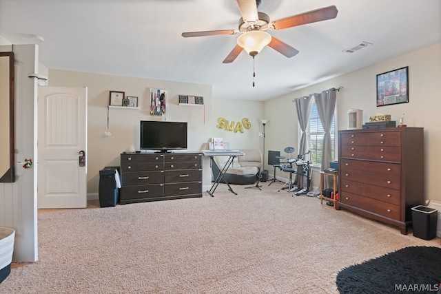 interior space featuring ceiling fan