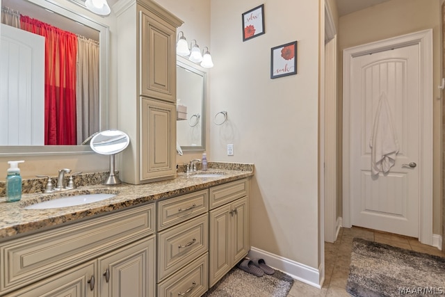 bathroom featuring vanity and tile patterned floors