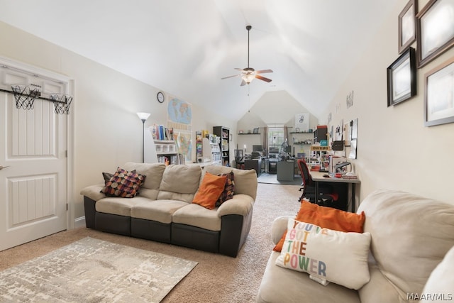 living room featuring carpet flooring, ceiling fan, and lofted ceiling