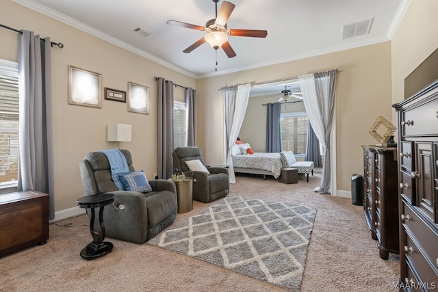 bedroom featuring ceiling fan, light colored carpet, and ornamental molding