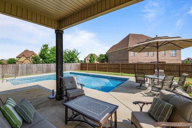 view of swimming pool featuring a patio