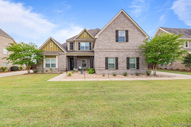 craftsman-style house with a front lawn