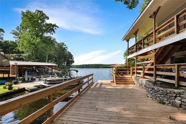 dock area with a water view