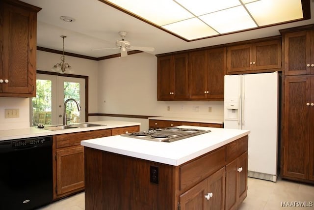 kitchen with stainless steel electric stovetop, a sink, light countertops, dishwasher, and white fridge with ice dispenser