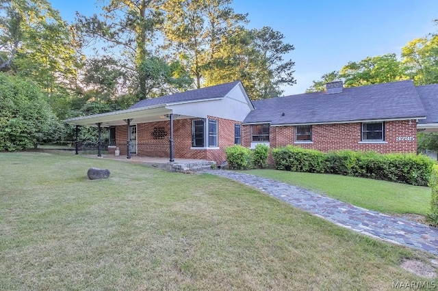 ranch-style house with a front yard