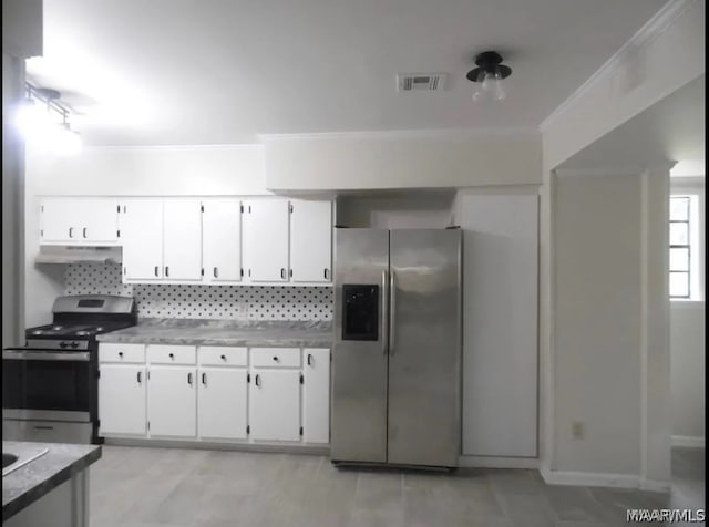 kitchen featuring white cabinets, decorative backsplash, crown molding, and appliances with stainless steel finishes