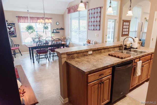 kitchen featuring decorative light fixtures, a chandelier, sink, and black dishwasher