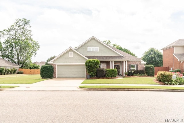 craftsman-style home with a front yard